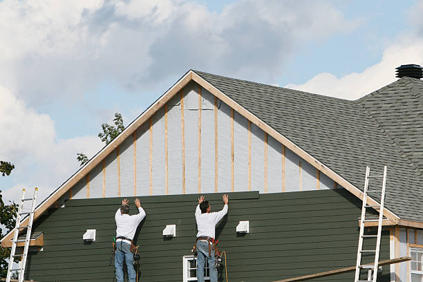 Professional Siding Contractor technician working in Woodford, VA